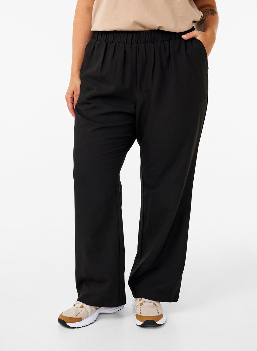 Flared broek met elastiek in de taille, Black, Model