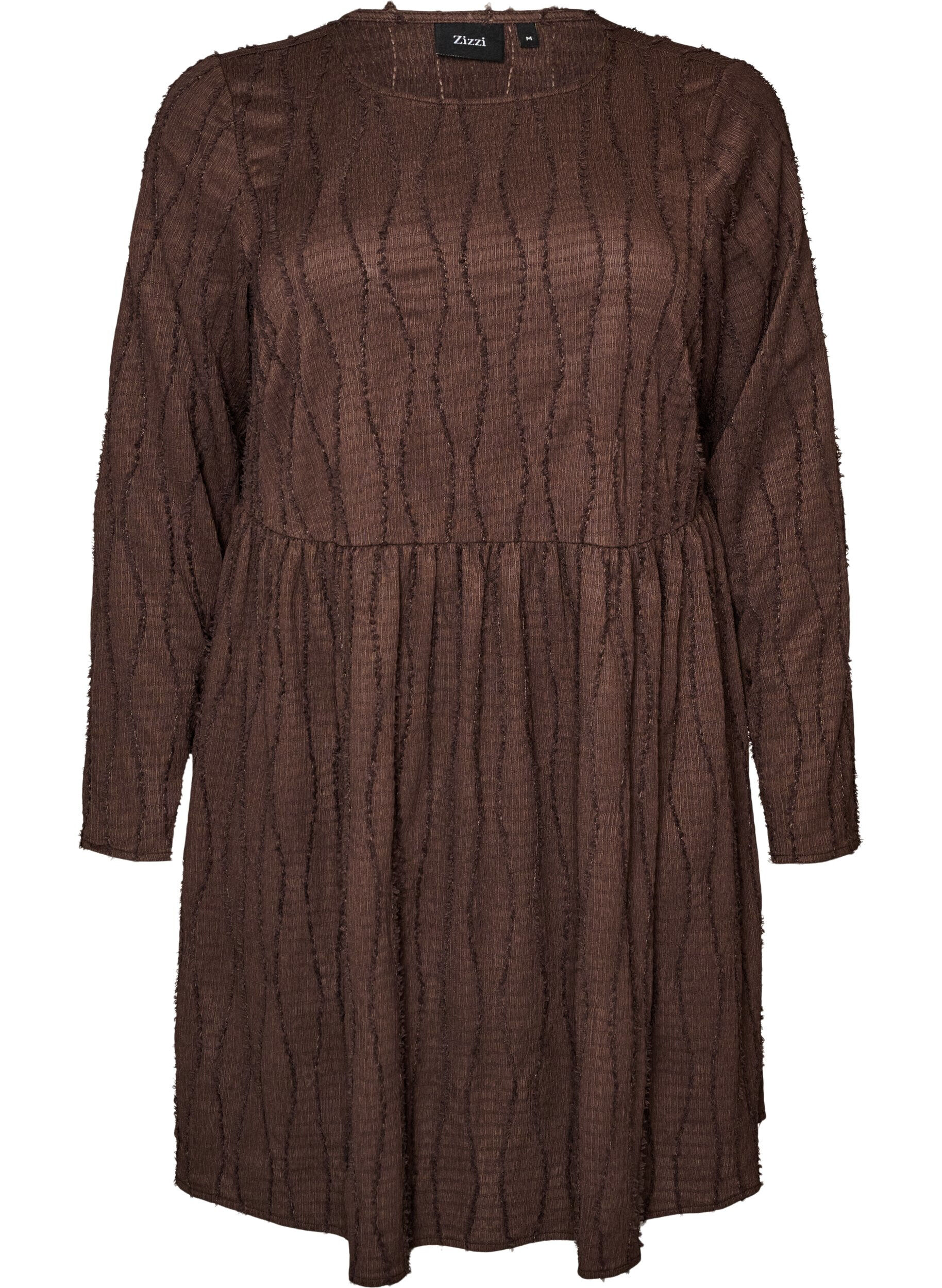 Korte jerseyjurk met een golvend textuurpatroon