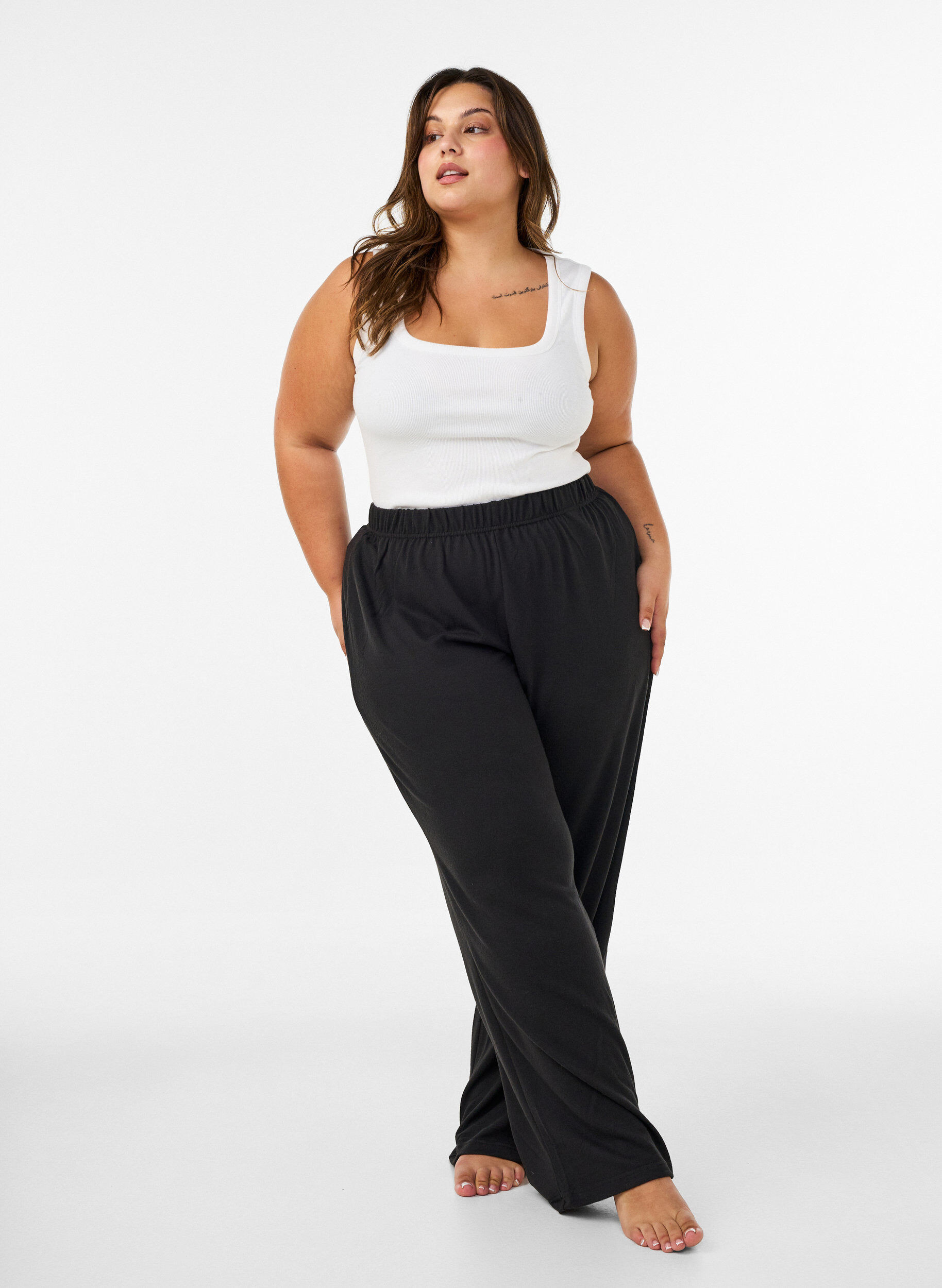 High waist jerseybroek met wijde pijpen, Zwart, Model