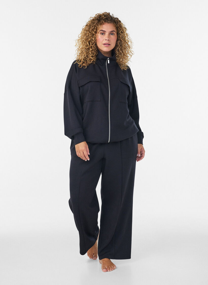 Jerseybroek met losse pasvorm, high waist en zakken, Zwart, Model image number 0