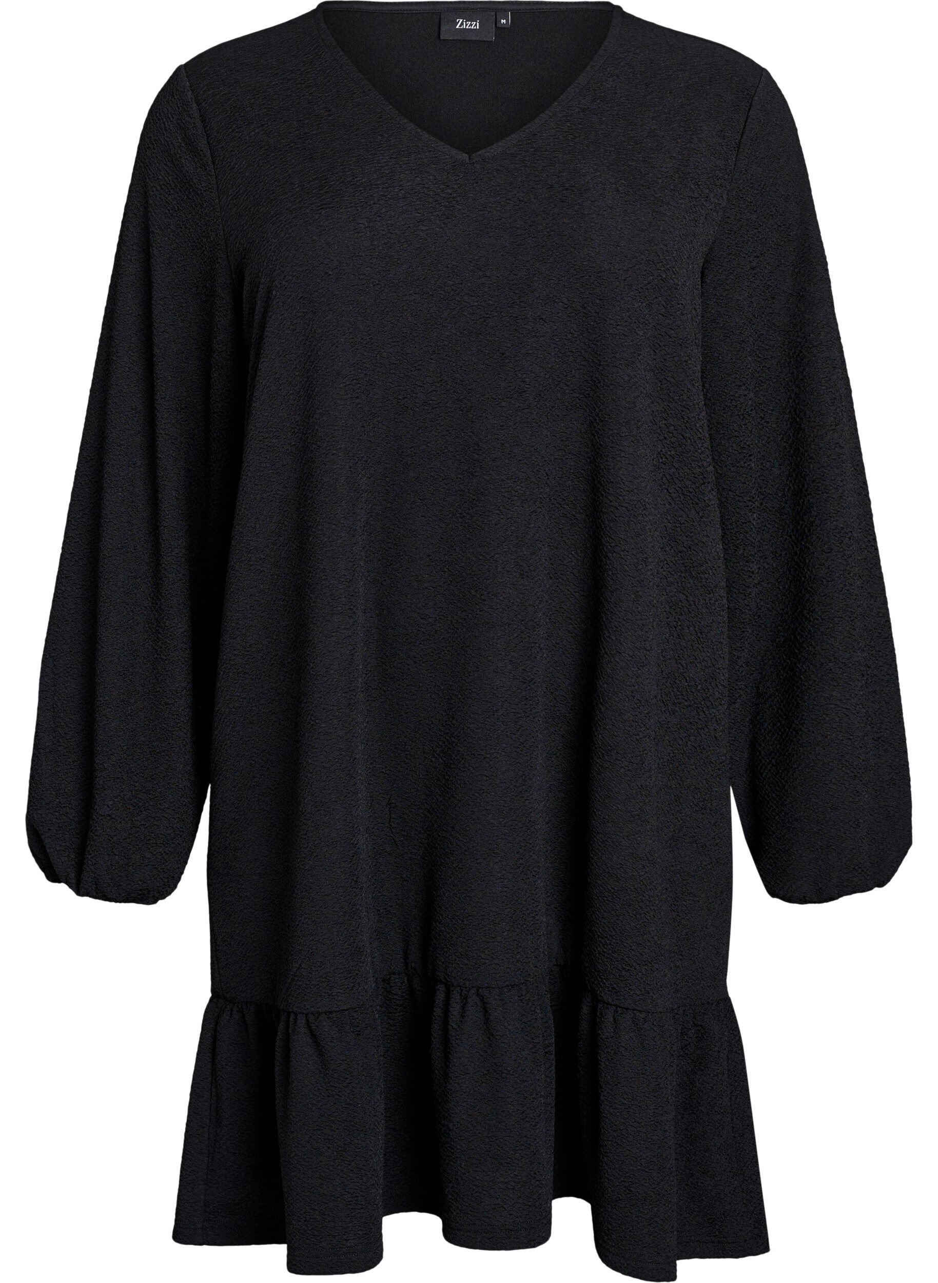 Korte jurk met een ruffle zoom en structuur