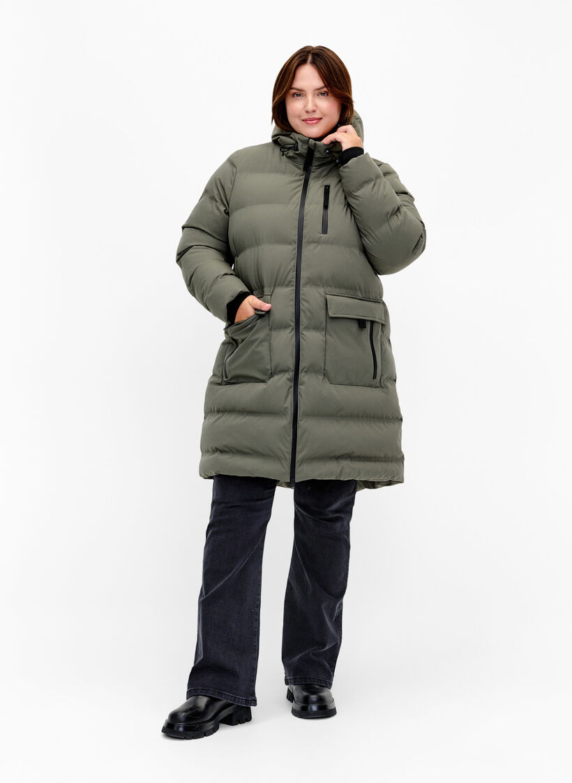Pufferjas met capuchon en zakken, Groen, Model image number 1
