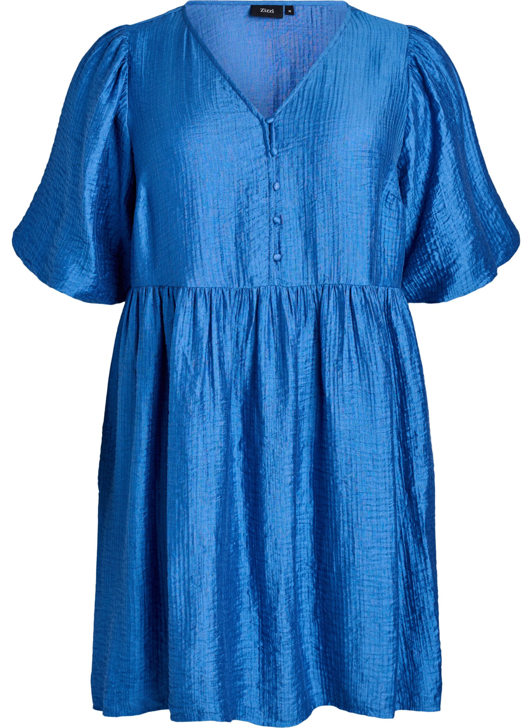 Korte jurk met textuur en korte ballonmouwen