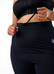 Running tights met lichte compressie en zijzakken, Zwart, Model image number 4
