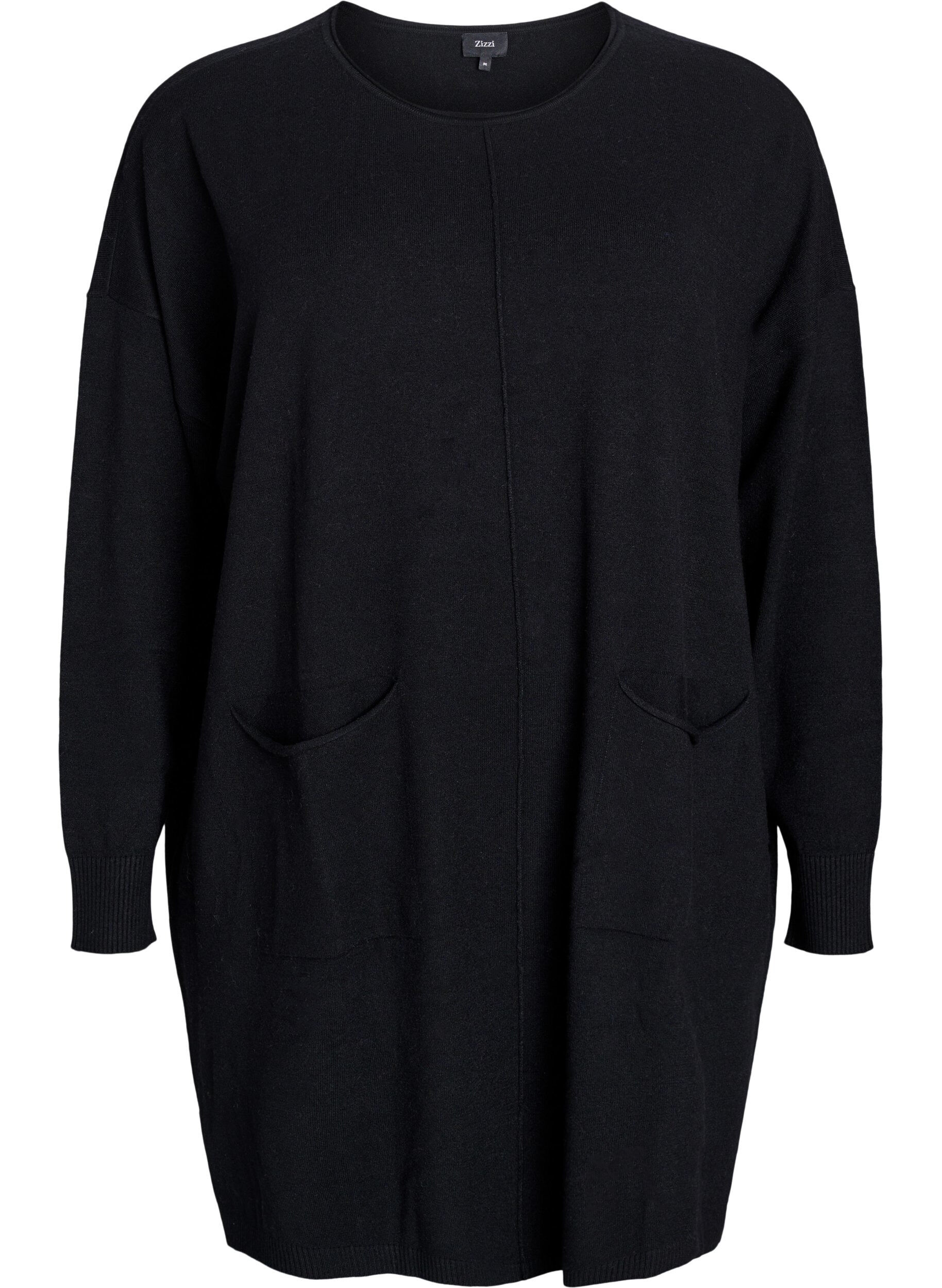 Korte gebreide jurk met middennaad en zakken