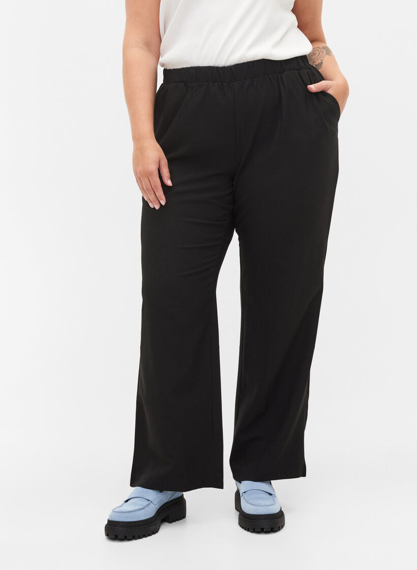 Flared broek met elastiek in de taille, Black, Model