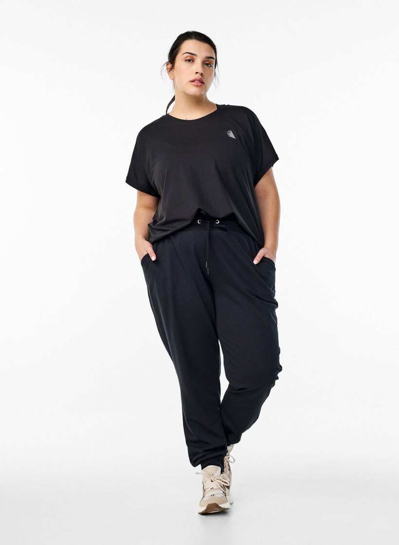 Losse trainingsbroek met zakken, Zwart, Model image number 1