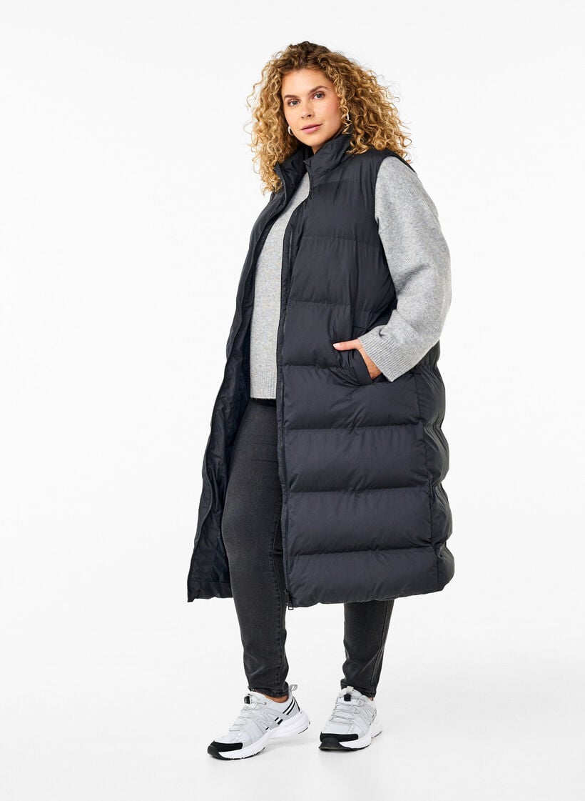 Lang vest met zakken en rits in twee richtingen, Zwart, Model image number 0