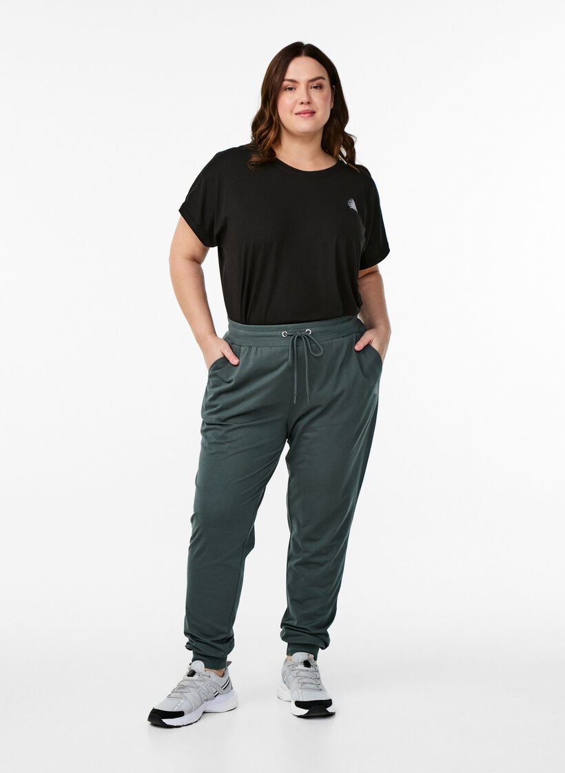 Pantalon de sport ample avec des poches, Vert fonc&eacute;, Model image number 0