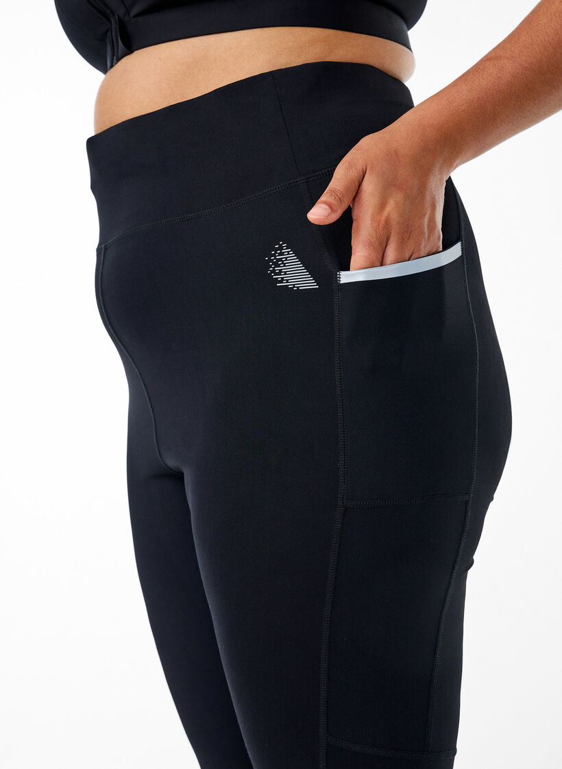 Running tights met lichte compressie en zijzakken, Zwart, Model image number 3