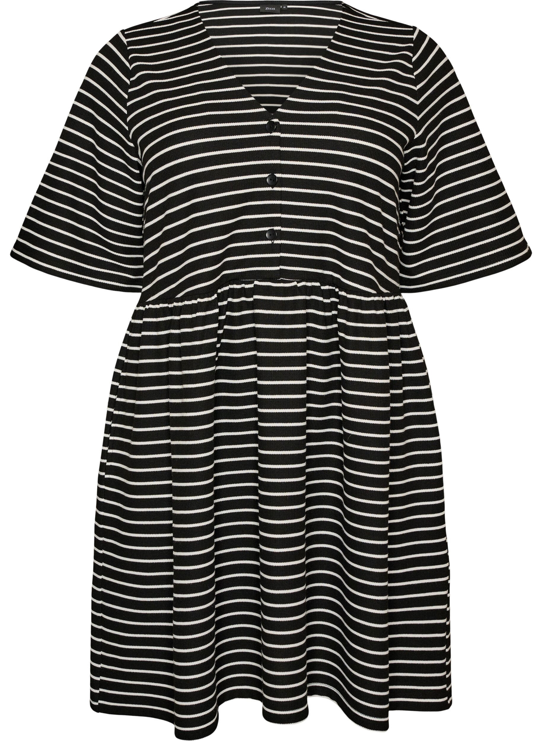 Jurk met een geribde textuur en een empirelijn