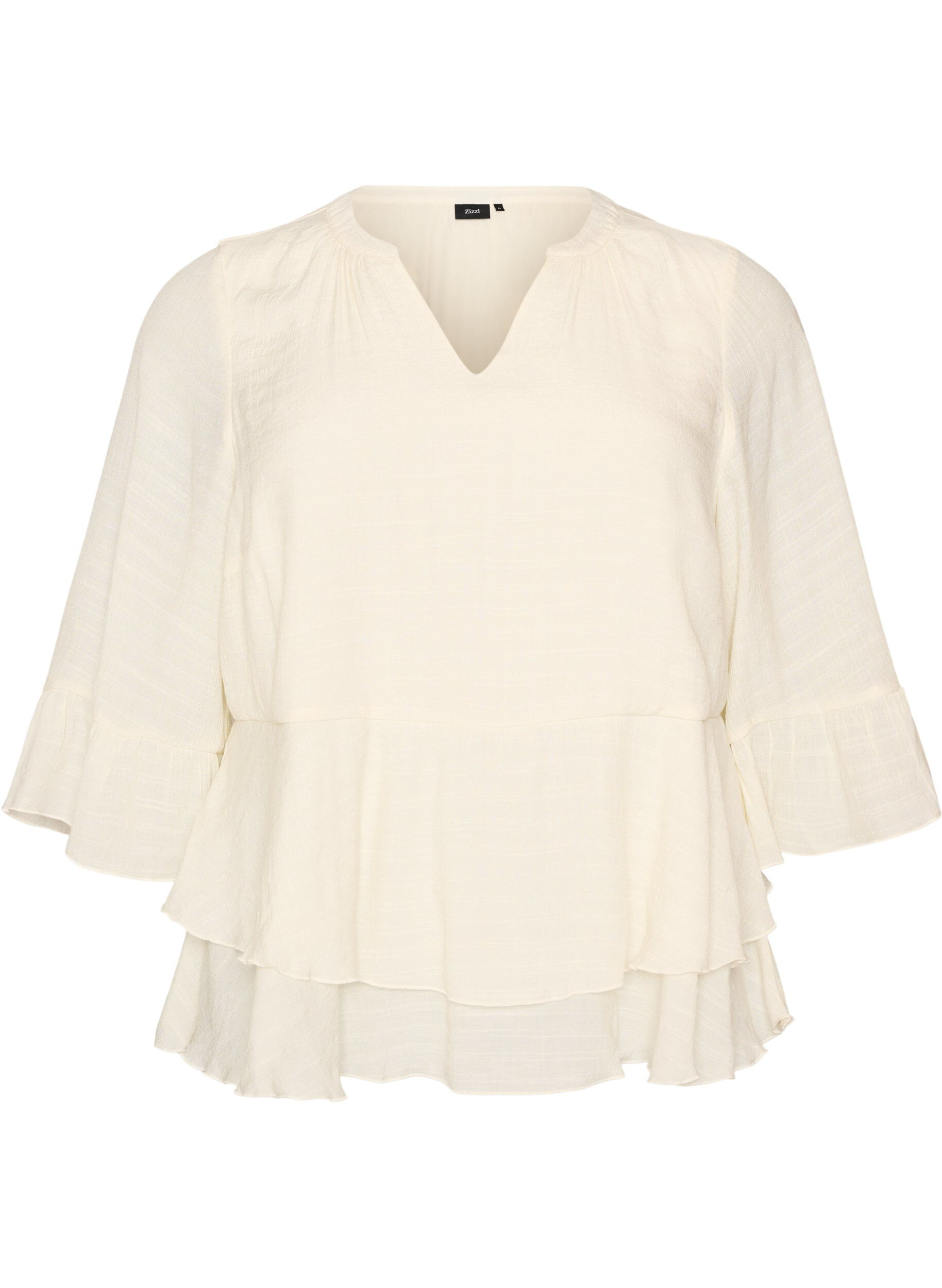 Blouse &agrave; manches 3/4 et volants