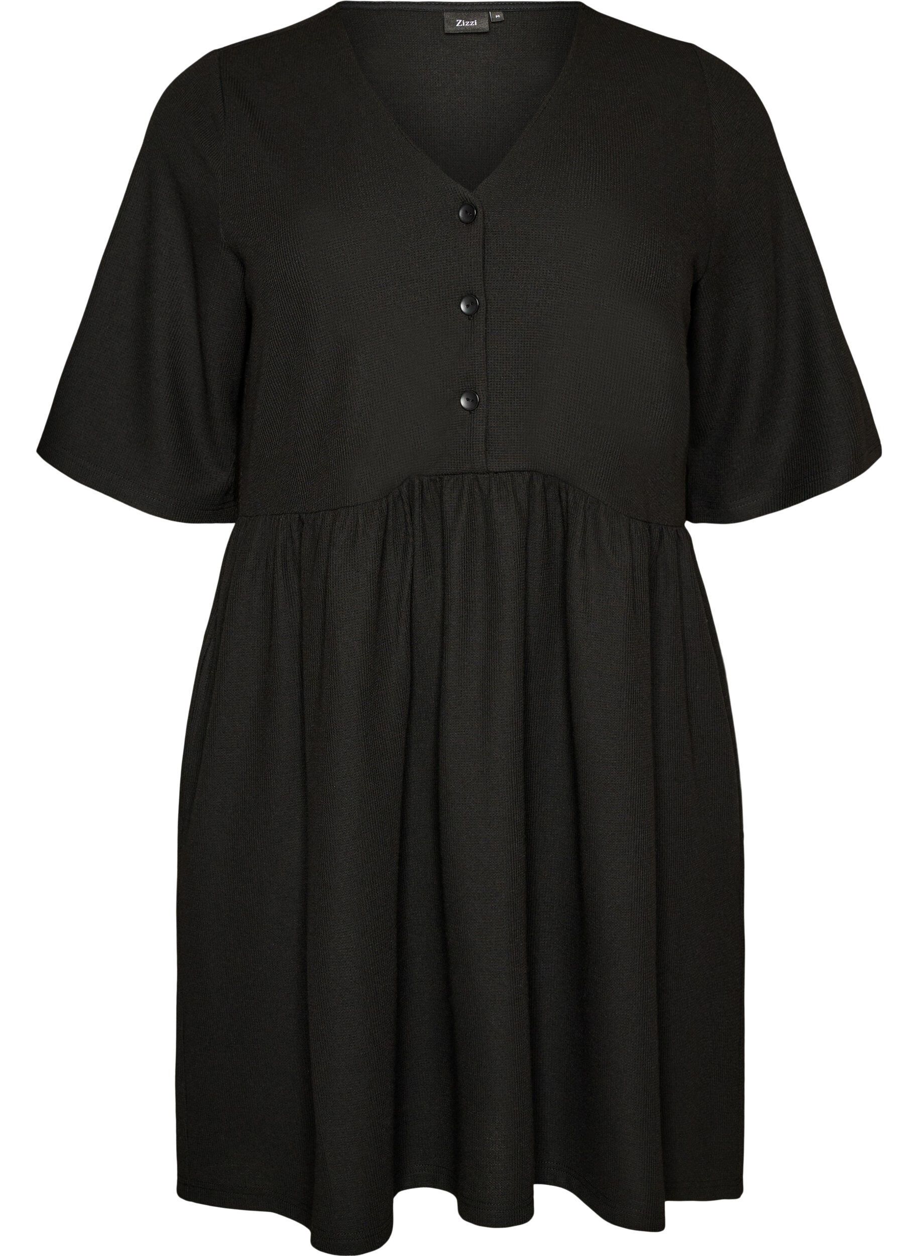 Jurk met een geribde textuur en een empirelijn