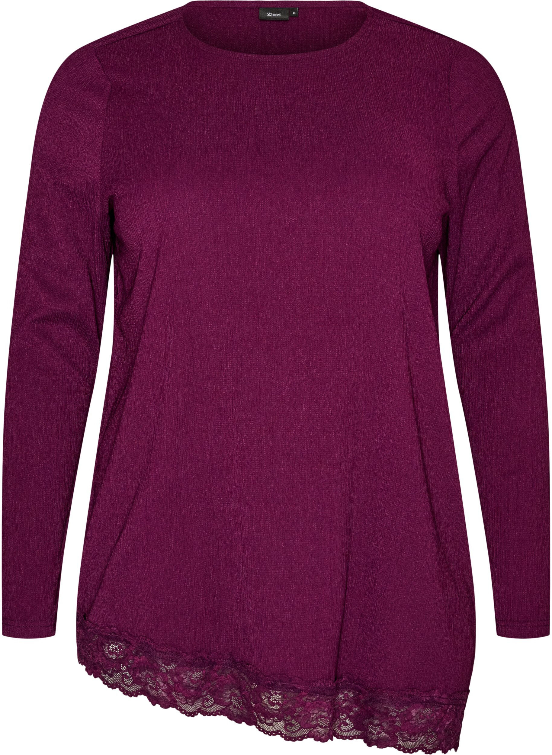 Jersey blouse met asymmetrische kanten rand