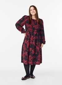 Bloemenjurk met een gesmockte top, Zwart Bloemenjurk met een gesmockte top, Zwart, Model