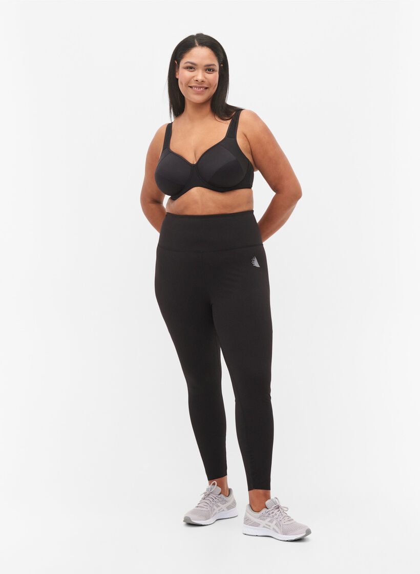 CORE, SUPER TENSION TIGHTS - Trainingslegging met binnenzak, Zwart, Model image number 1