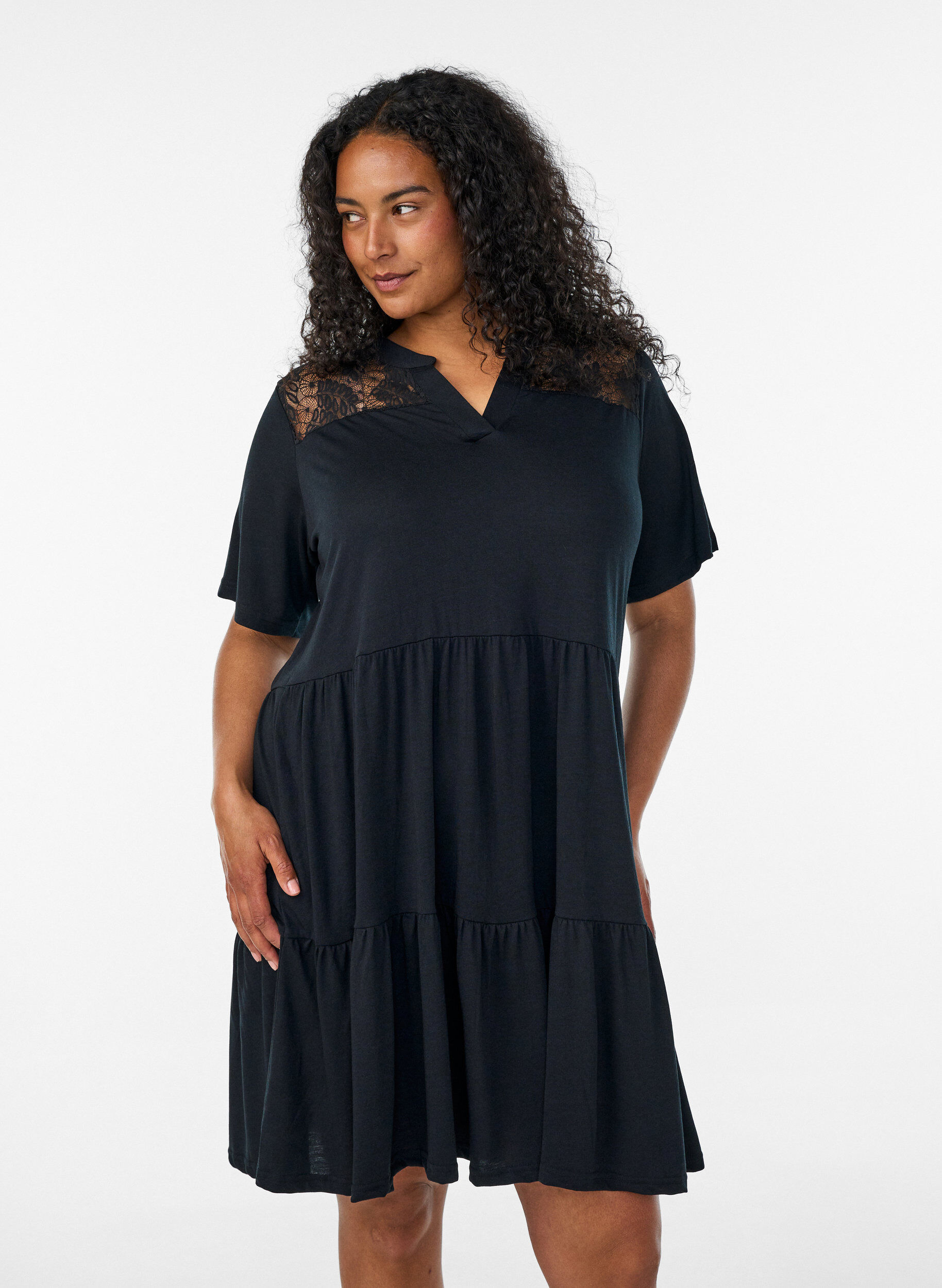 Jerseyjurk met kanten details en een gelaagde rok, Zwart, Model