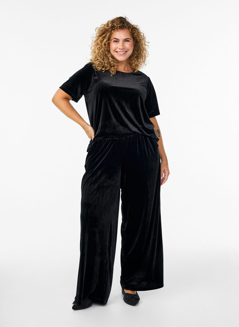 Veloursbroek met een high waist en wijde pijpen, Zwart, Model