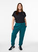 Losse trainingsbroek met zakken, Groen, Model image number 1