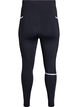 Running tights met lichte compressie en zijzakken, Zwart, Packshot image number 1