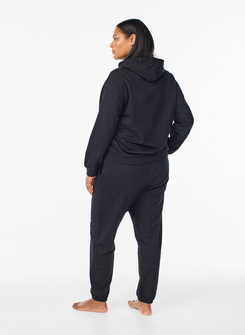 Trainingsbroek met zakken, Zwart, Model image number 1