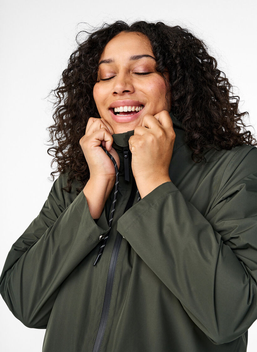 Regenjas met zakken en capuchon, Groen, Model image number 3