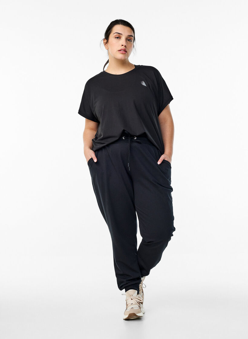Pantalon de sport ample avec des poches, Noir, Model image number 1
