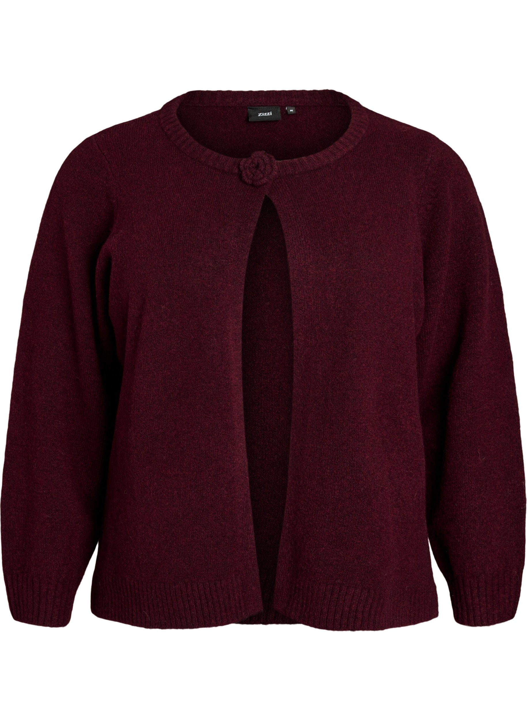 Gebreid vest met bloemdetail