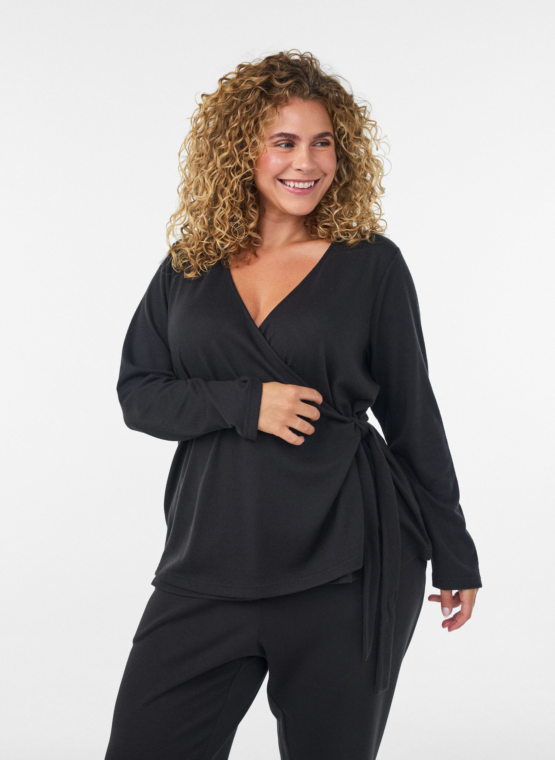 Jersey wikkelblouse met een striksluiting, Zwart, Model