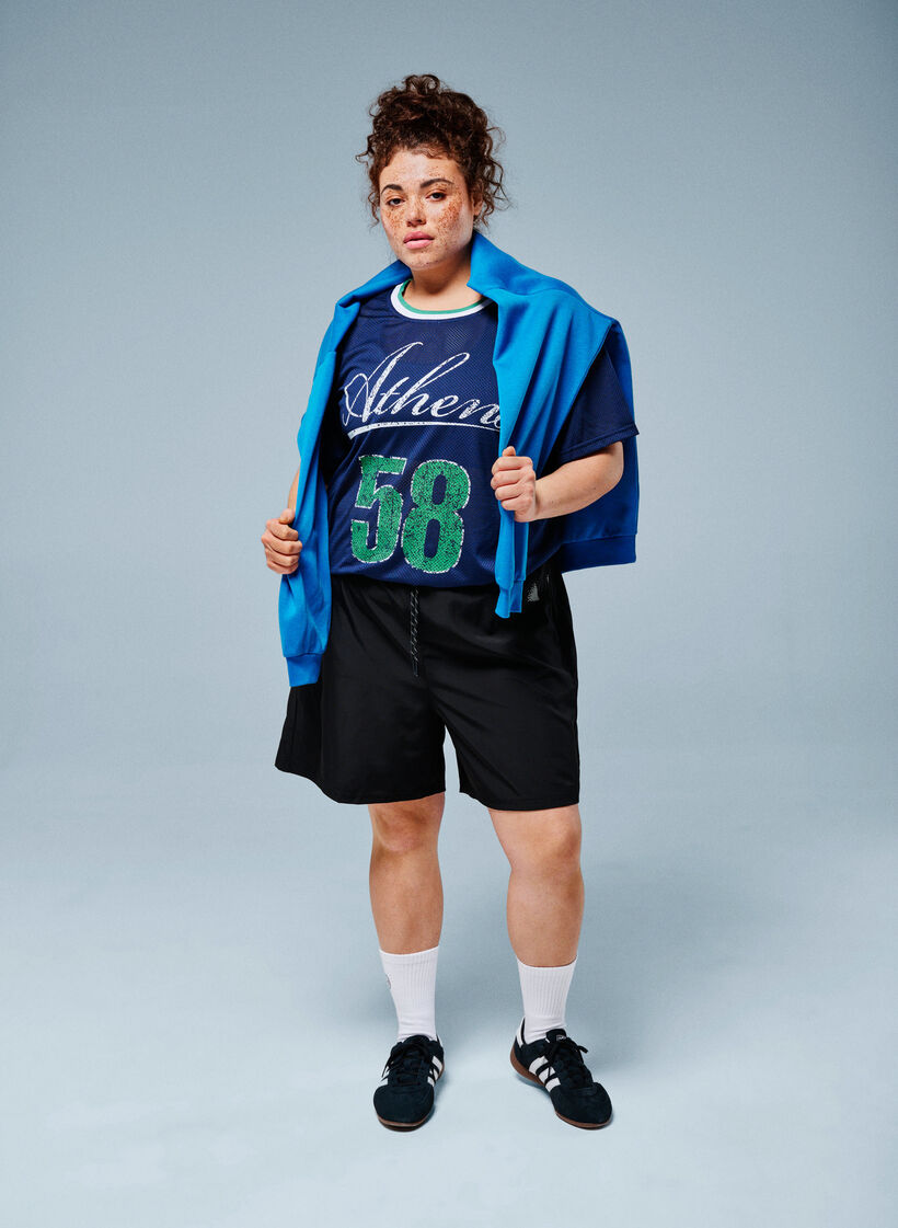 Short d&rsquo;entra&icirc;nement avec short int&eacute;rieur et poche t&eacute;l&eacute;phone, Noir, Image image number 0