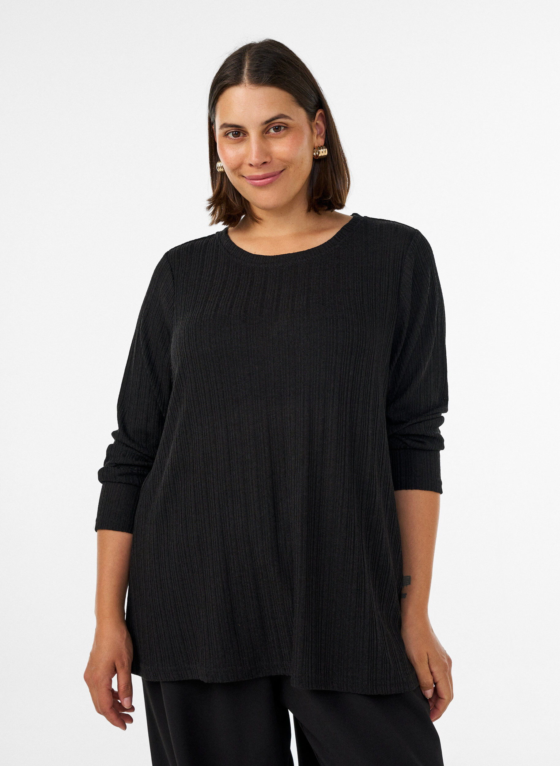 Jersey blouse met geribde structuur en lange mouwen, Zwart, Model