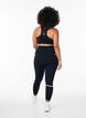 Running tights met lichte compressie en zijzakken, Zwart, Model image number 2